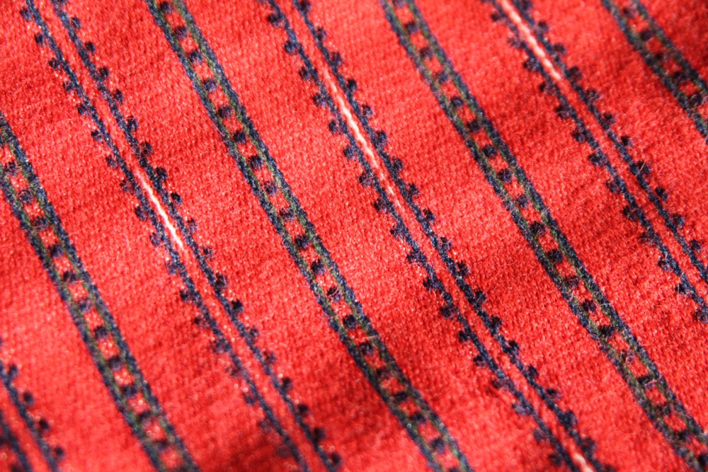 Etelä-Pohjanmaan miehen kansallispuku, käsinkudottu parkkumi, flammu