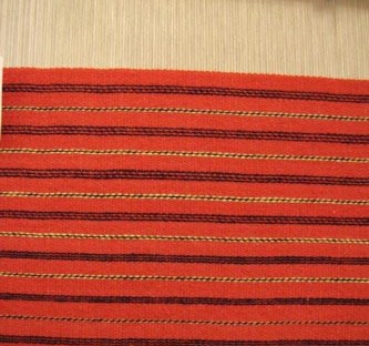 akaan miehen kansallispuku, käsinkudottu kansallispukukangas